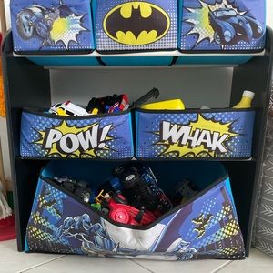 Toddler Batman bedroom set includes bed with toddler mattress, table and cubby.